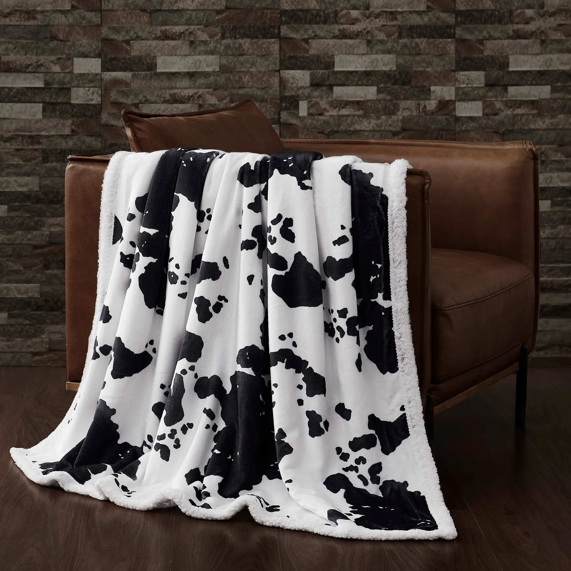 Safe Elsa Cowhide Campfire Sherpa Throw Functional
