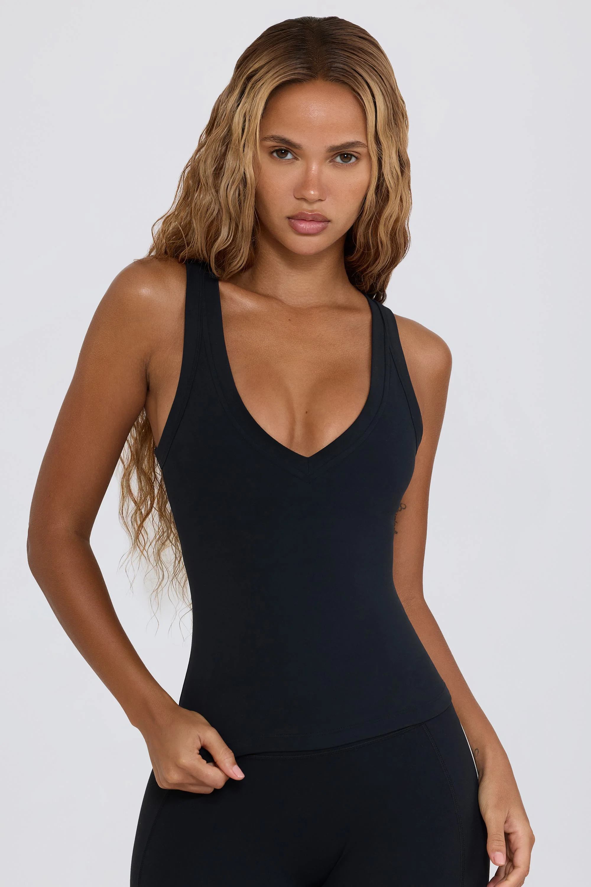 Clean Soft Active V-Neck Tank Top in Black Trusted
